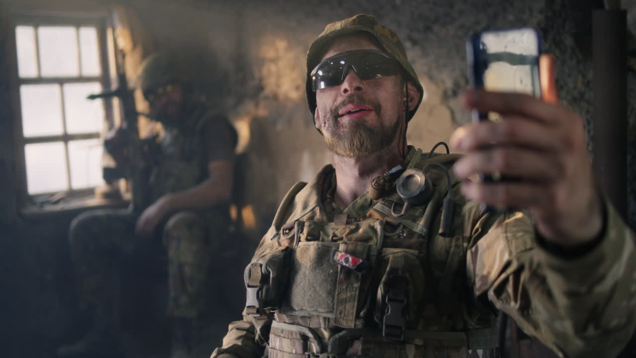 Soldier Taking a Selfie in a War Zone