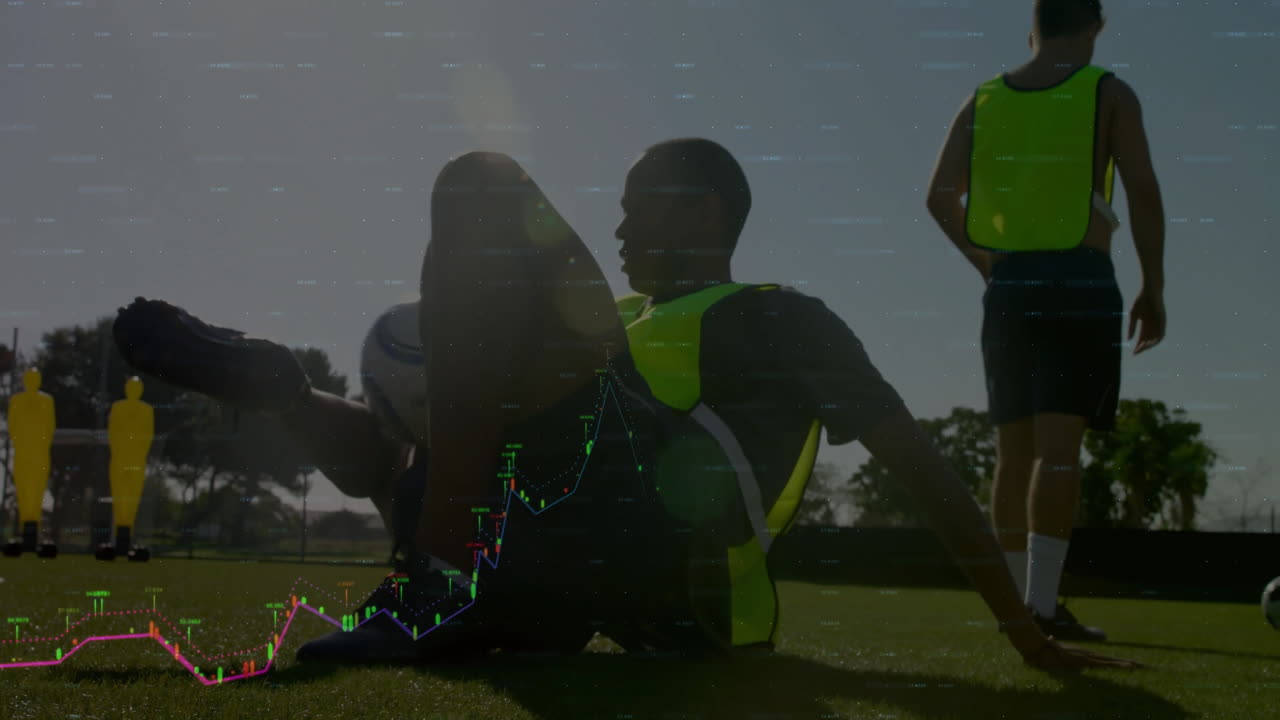 Male soccer players training on grass field, with animated financial charts floating above pitch
