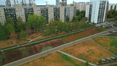 aerial view of a city park with apartment buildings