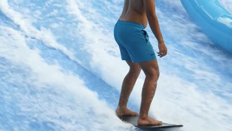 indoor surfing in a wave pool