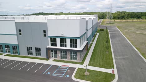 Orbiting-Aerial-Shot-of-Modern-Generic-Office-Building-in-American-Suburb