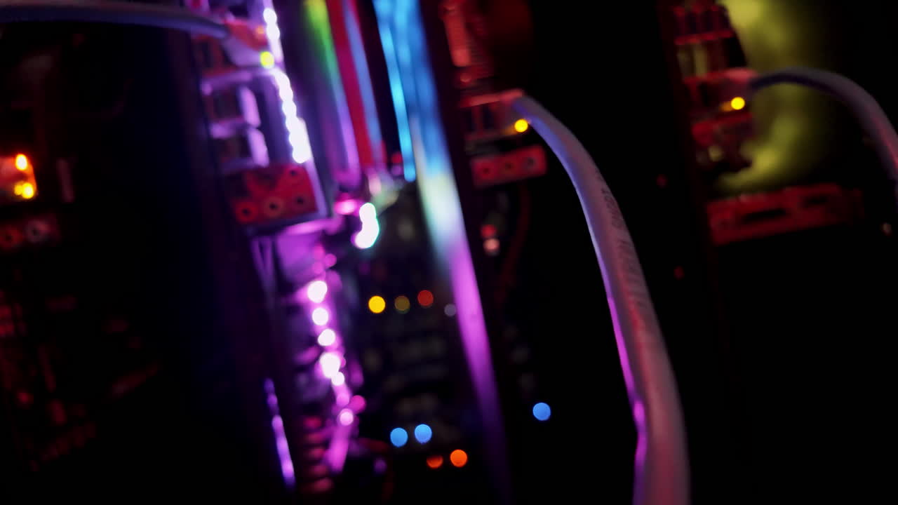 Close up of a server with flashing colourful lights in a data center