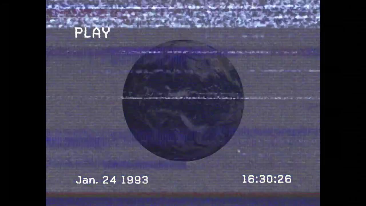 Vintage VHS Footage of Earth Globe with Static Interference