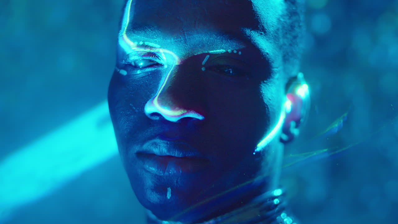 Portrait of African American Man with Tribal Makeup in Laser Light
