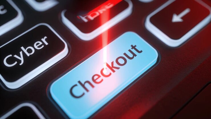 Scanning red beam appearing overhead, moving across blue Checkout key in keyboard close-up, glowing