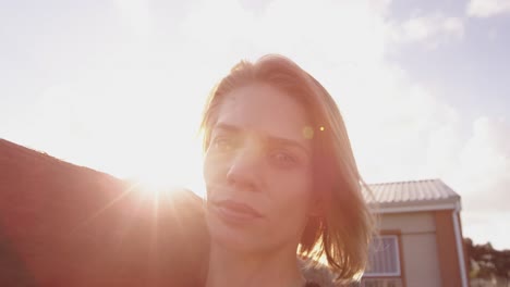 portrait of young woman training at an outdoor gym bootcamp