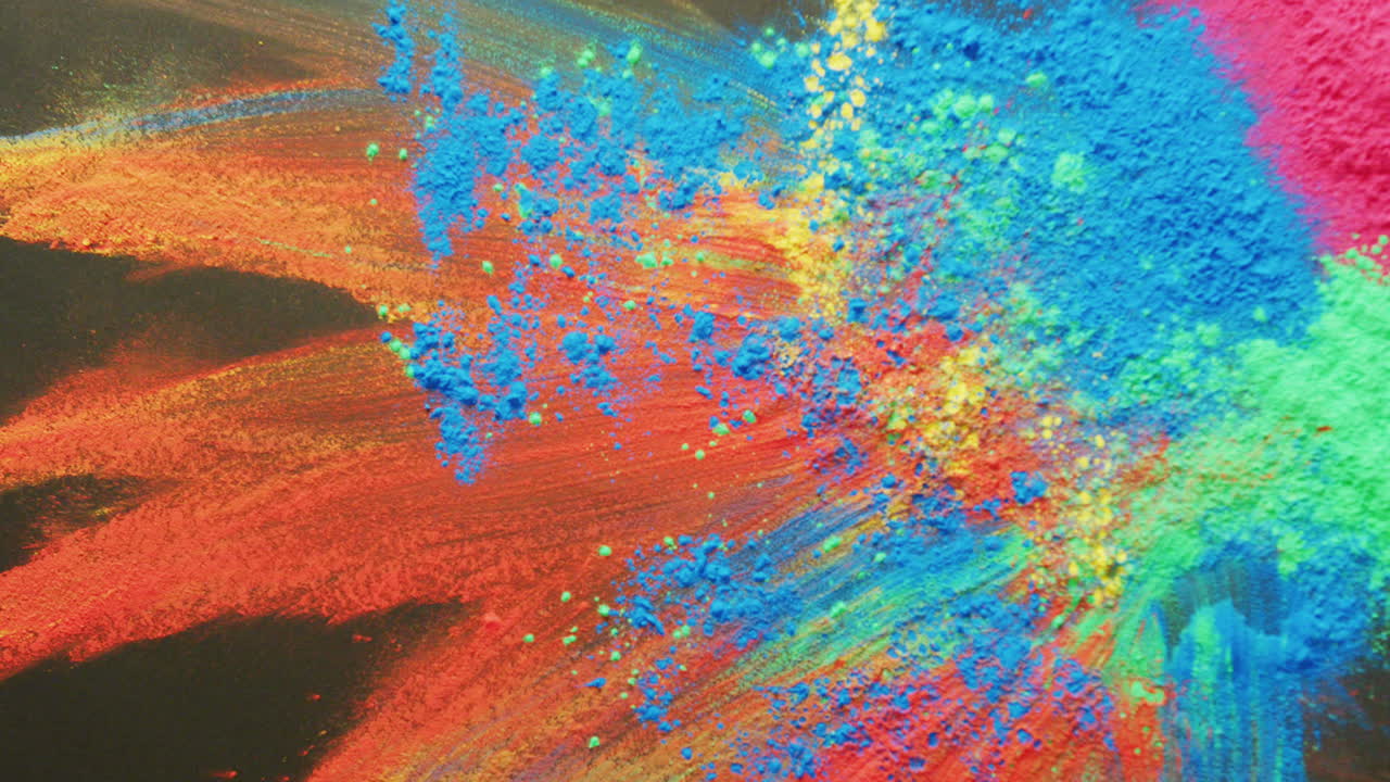 검은색 배경에 복사 공간이 있는 다채로운 파우더의 비디오