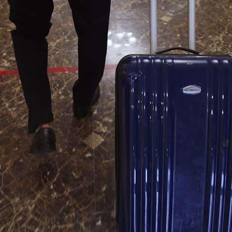 man arriving at hotel