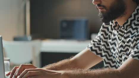 Middle-Eastern-Man-Using-Laptop