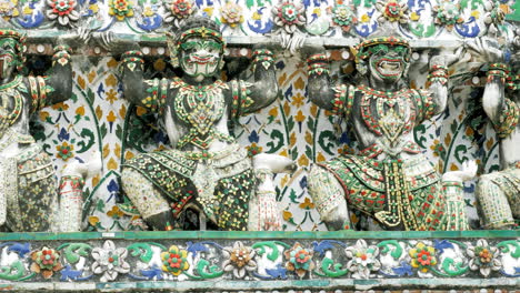 thai traditional literature ancient giant statue around the base and pagoda of wat arun