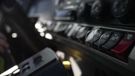 commercial driver turns truck switches on at work site