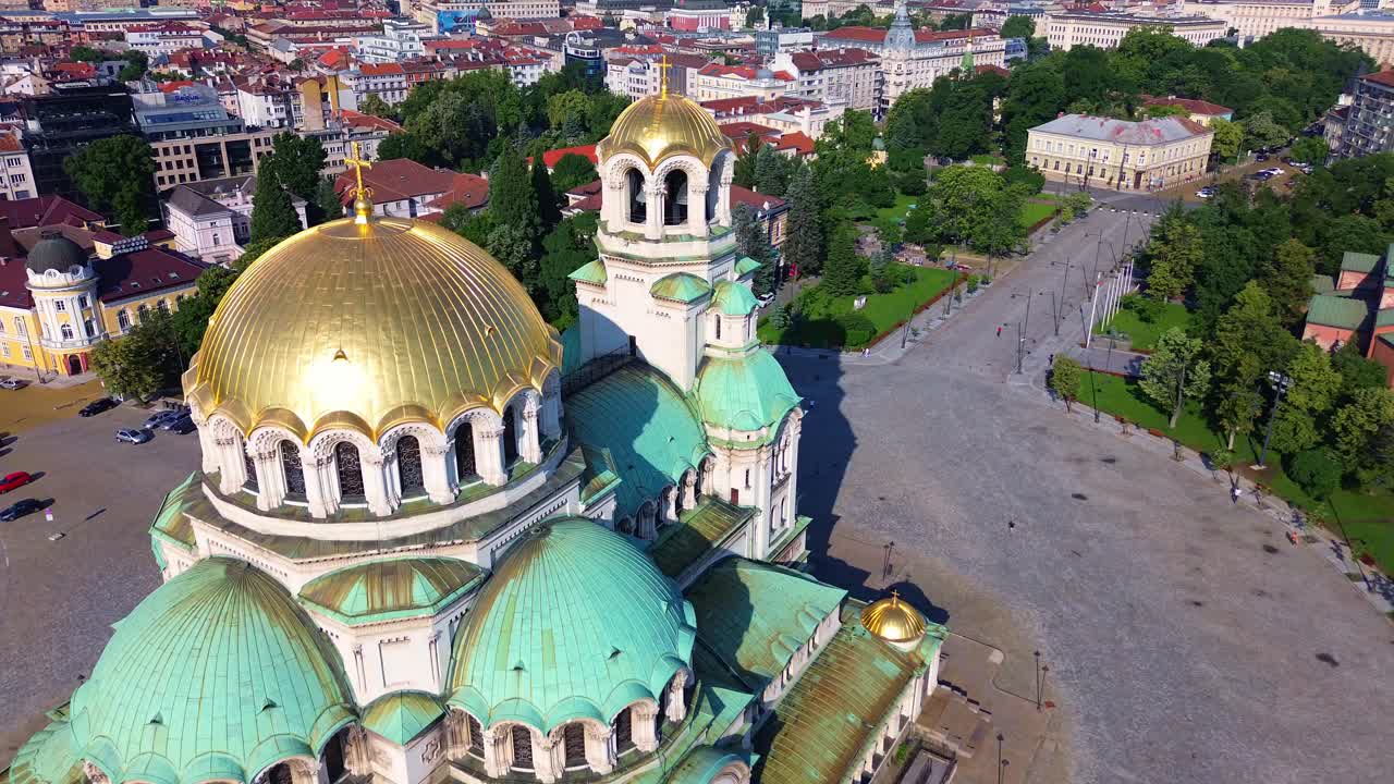 Close-up aerial shot of the golden domes of Saint Alexander Nevsky Cathedral, a Bulgarian Orthodox cathedral built in Neo-Byzantine style in Sofia, Bulgaria