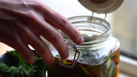 Opening-a-jar-of-fresh-food--second-angle