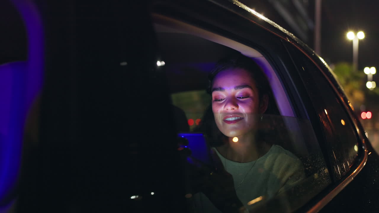 Woman in car at night