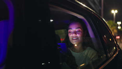 woman in car at night