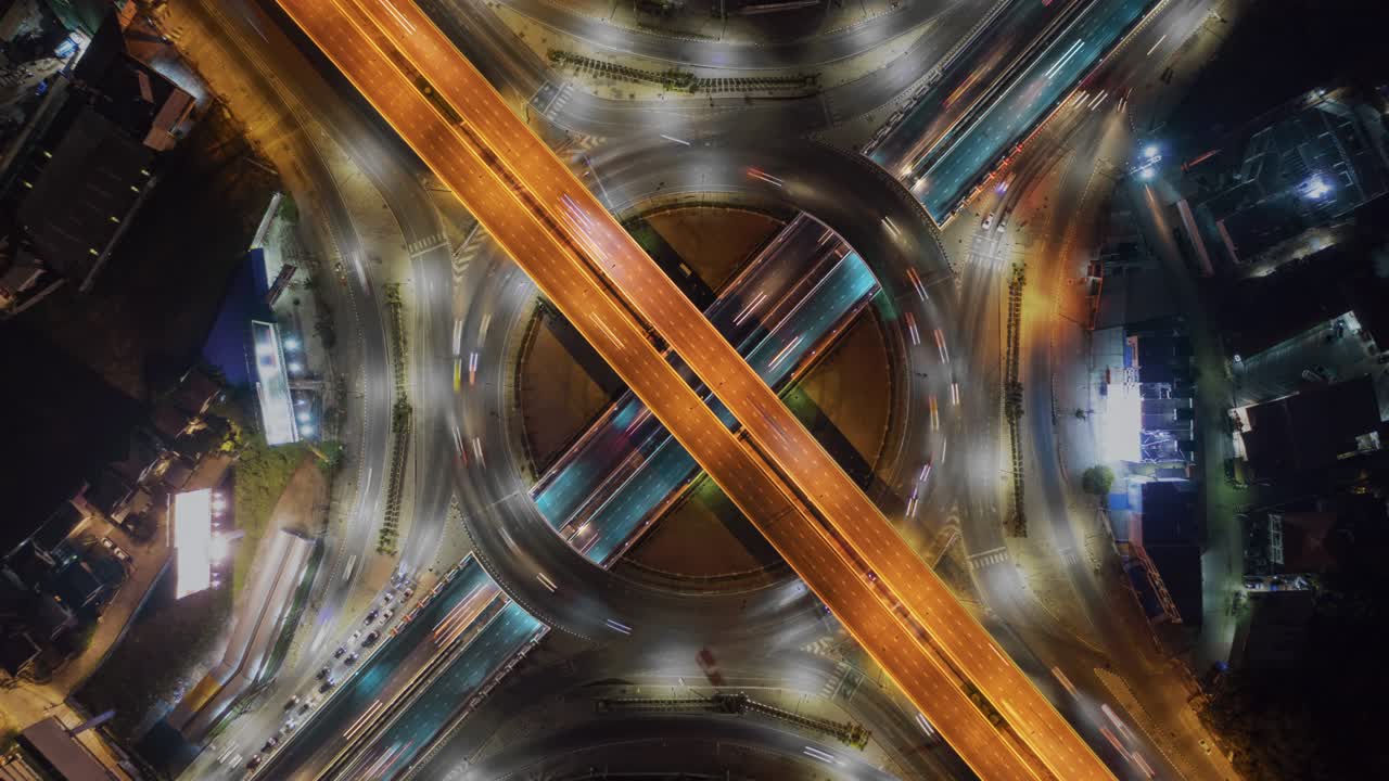 Time lapse Aerial view and top view of traffic round road and building
