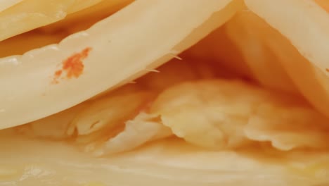 close-up of texture fermented spicy cabbage kimchi with in can. preservation of vegetables in glass jars. fermentation preserved kimchi cabbage with spices macro. asian cuisine. high quality 4k footage