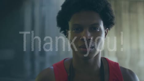 Animation-of-thank-you-text-over-smiling-biracial-sportsman