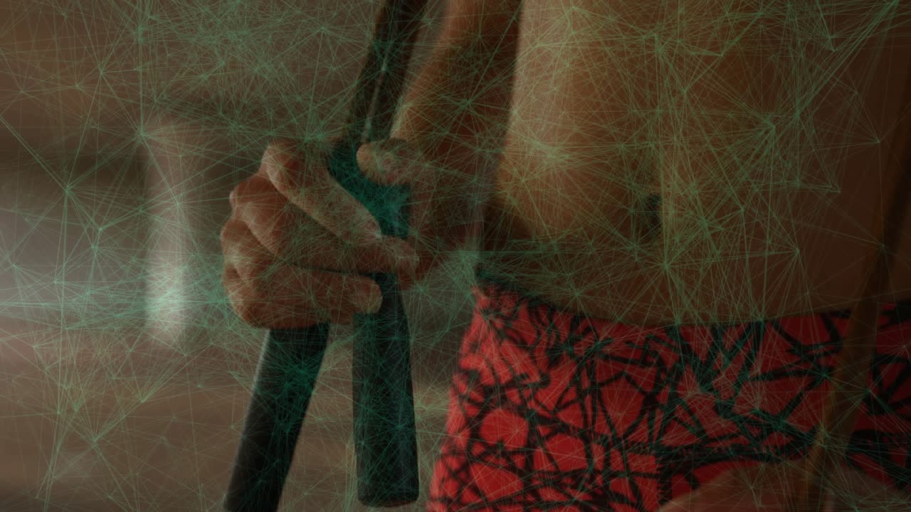 Woman gripping strap drawing up while green overlay appearing straightening and turning for workout