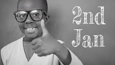 animation of 2nd jan text over happy african american schoolboy on grey background