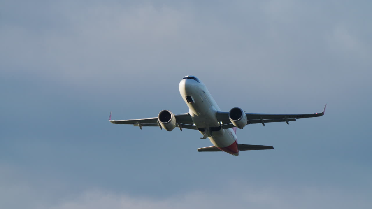 MADRID, SPAIN - APRIL 1, 2025: An Iberia Airbus A320 takeoff from Adolfo Suarez Madrid-Barajas Airport. The aircraft is lifting off the runway with the Iberia livery clearly visible.