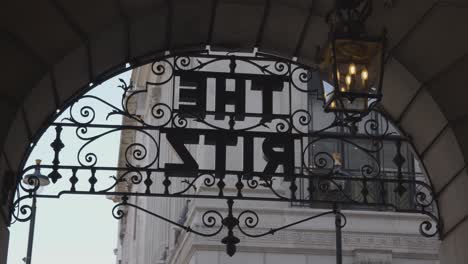 Close-Up-Of-Sign-Outside-The-Ritz-Hotel-On-Piccadilly-In-London-UK