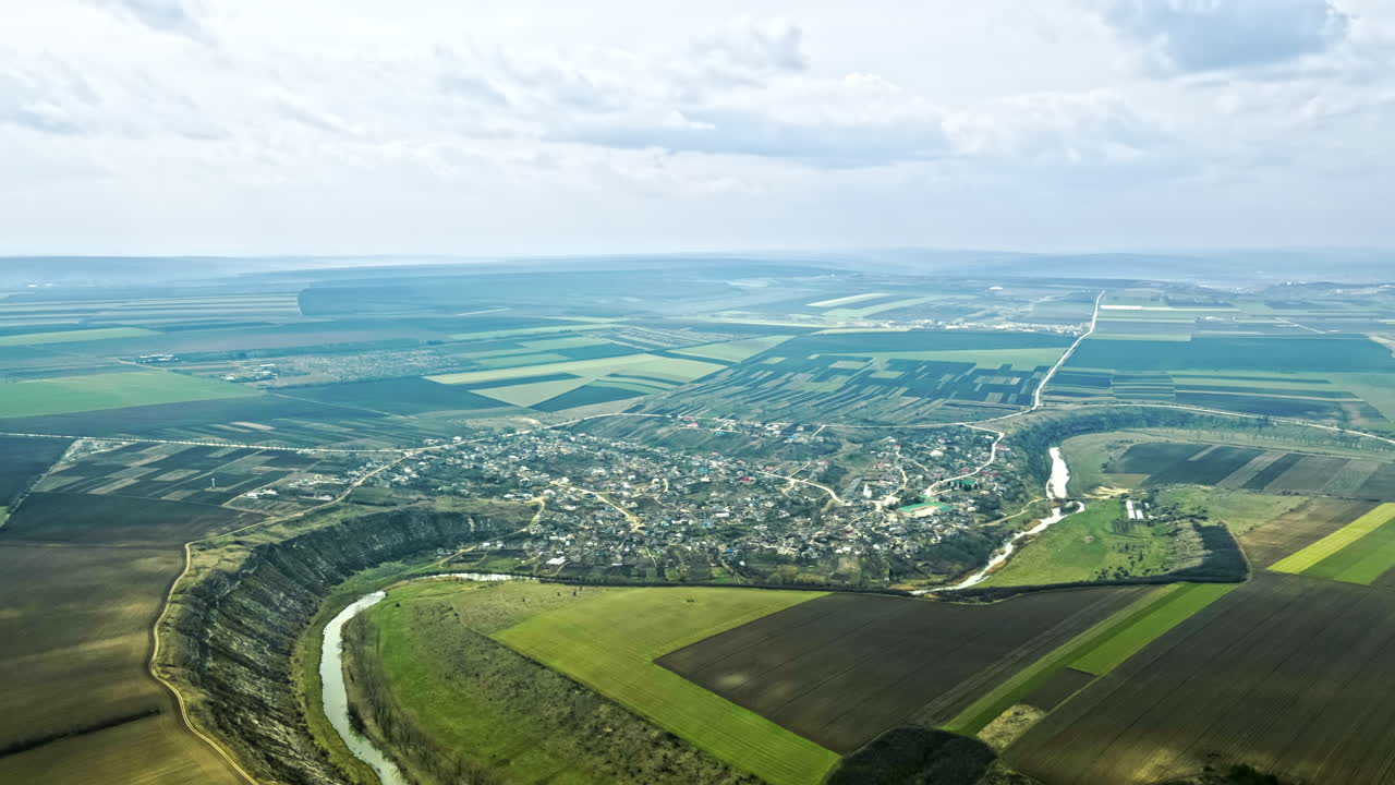 Aerial drone hyperlapse of Orheiul Vechi landscape in early spring. Raut river. Moldova beauties landmarks