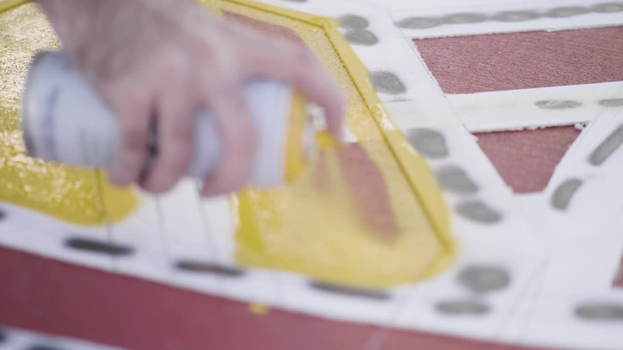 Close-up of precise yellow paint marking on the ground at a construction site in Neot Smadar - Israel