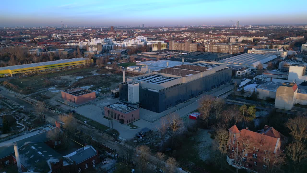 Large data center building processing information and connecting global network infrastructure. Lovely aerial view flight panorama overview drone