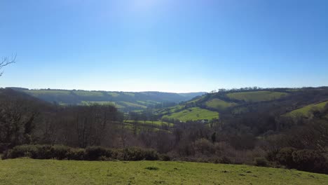 panning right shot of a valley in east devon england on a sunny day