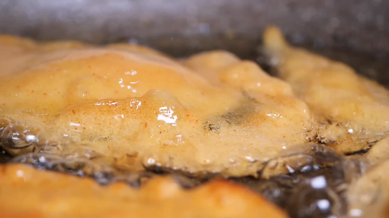 Deep-fried Food Being Cooked in Hot Oil