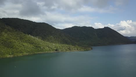 scenic lake landscape with mountains and lush greenery