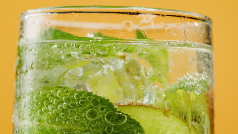 refreshing summer cocktails with mint, lime, and kiwi
