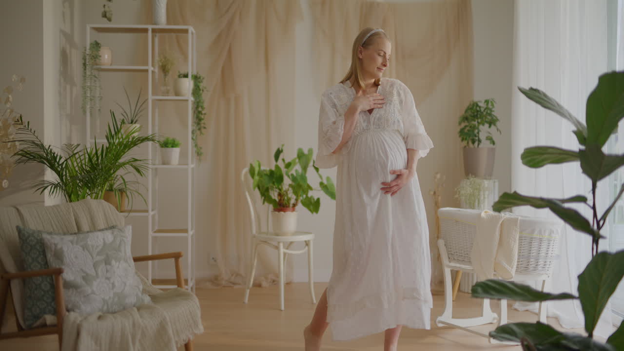 Pregnant Woman Dancing in Beautifully Decorated Room