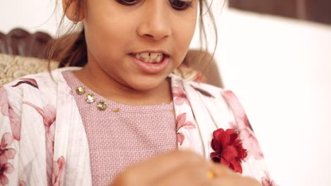 portrait of an indian child at home during coronavirus lockdown