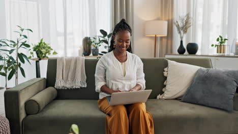 Black-woman-on-sofa,-smile