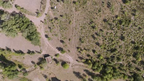 Rotating-and-confusing-birds-eye-view-over-countryside-at-Spain