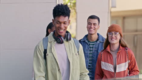 group of smiling college students on campus