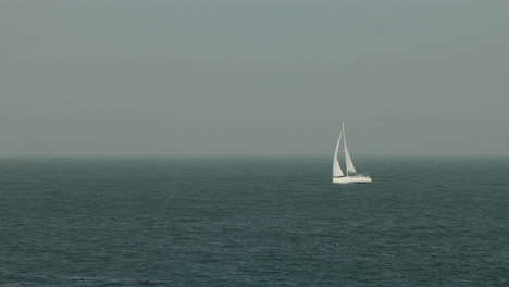 a sailboat in monterey bay in california