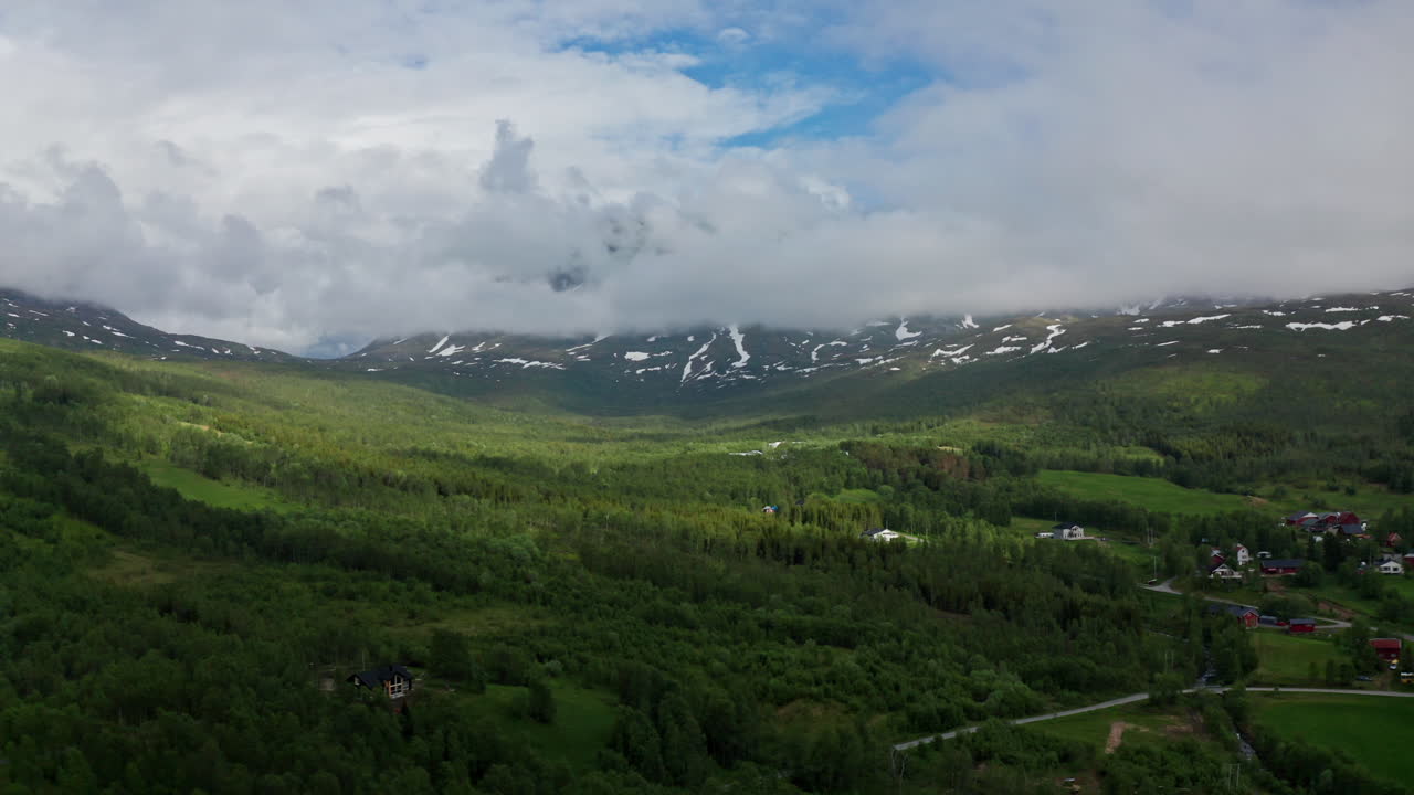 Aerial drone over the green majestic landscape in the Lofoten Islands, Norway.