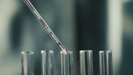 drugs added to test tubes in a laboratory