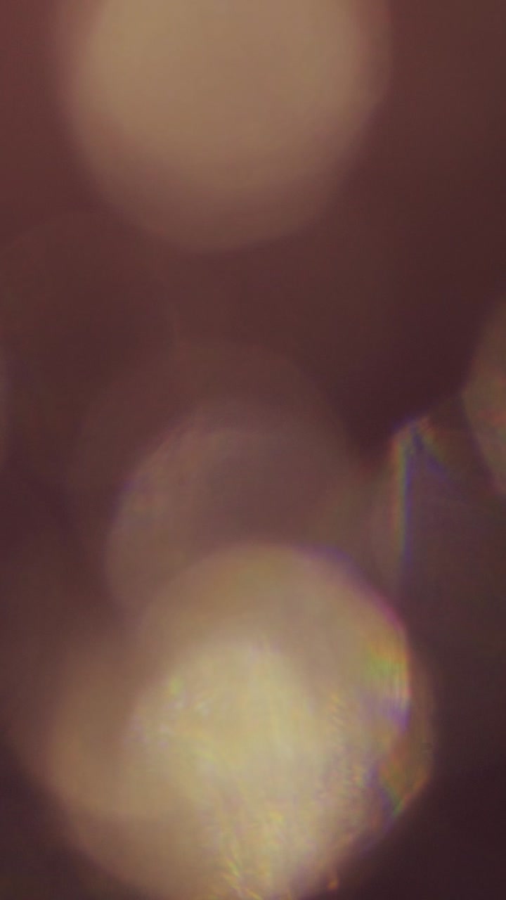 Abstract Light Leaks and Bokeh Overlay Background