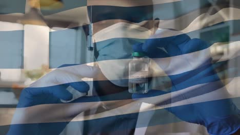 Animation-of-flag-of-greece-waving-over-doctor-wearing-face-mask-and-holding-vaccine