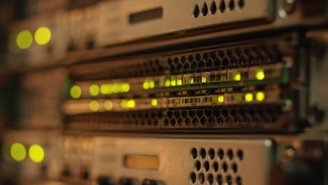 a close-up view of network server hardware with illuminating lights indicating active connections and data transfer within a datacenter environment