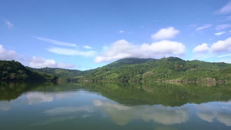 aerial view on a lake among mountain in the area of the dam. landscape of green canyon aerial view 4k high quality video footage