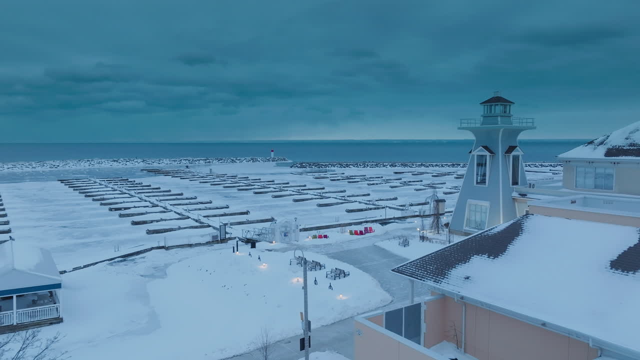 Snowy Bronte Harbour with Lake Ontario in winter's calm, serene atmosphere