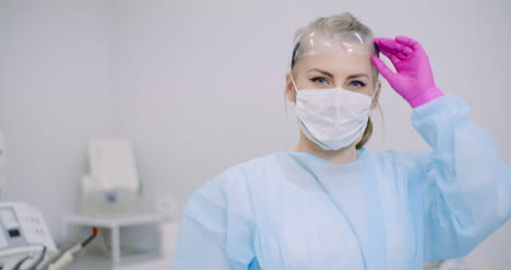 researcher holding covid 19 sample tube in hand 5