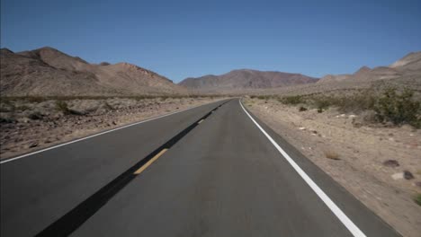 a highway runs through the desert