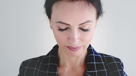 businesswoman meditating in a modern office setting