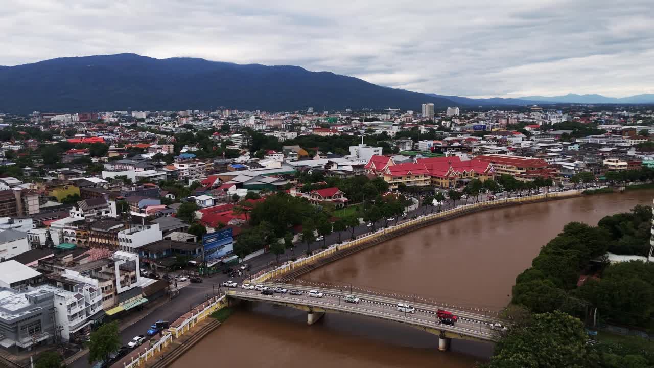 Aerial panoramic of Chiang Mai, Thailand with ping river cityscape drone cloudy day